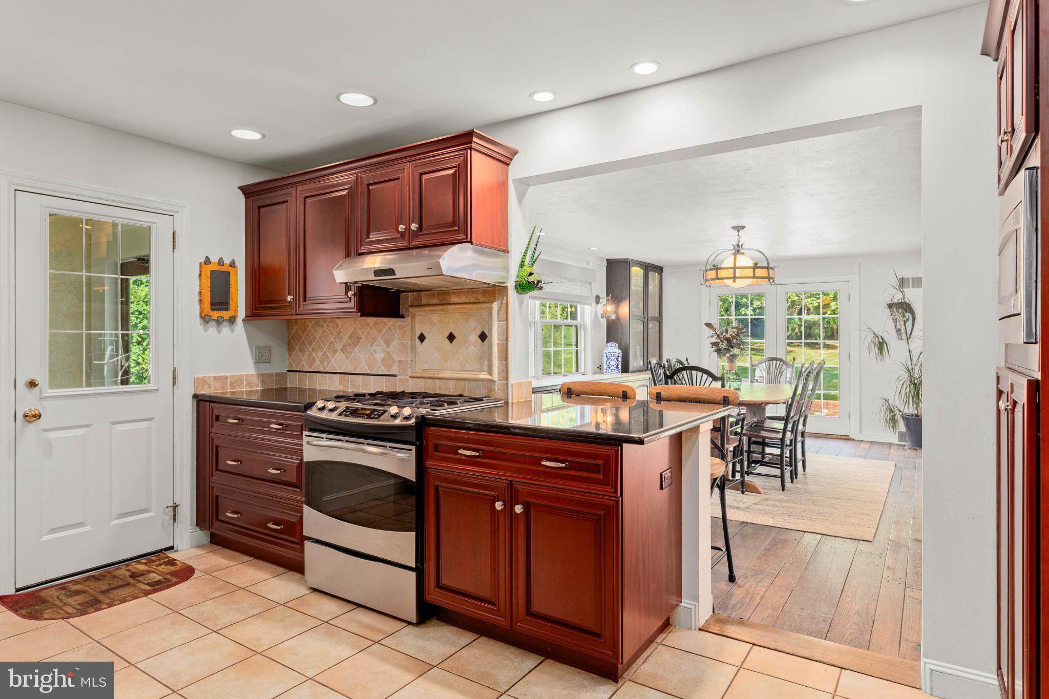 407 Fairview Road Penn Valley, PA 19072 - Photo 3 of 59 Bright kitchen with rich wood accents.