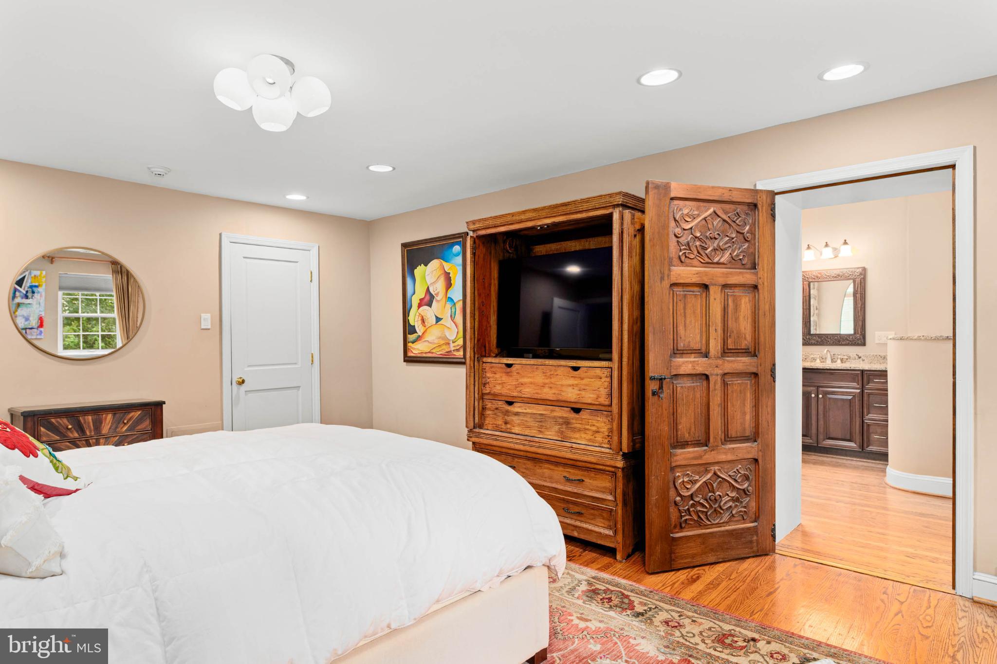 407 Fairview Road Penn Valley, PA 19072 - Photo 32 of 59 Charming main bedroom with rustic elegance.