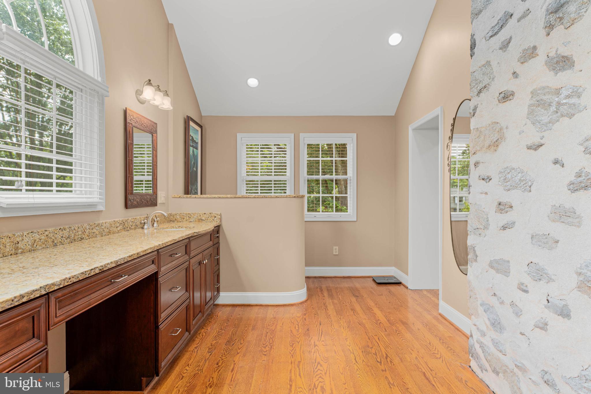 407 Fairview Road Penn Valley, PA 19072 - Photo 34 of 59 Elegant bathroom with natural light & stone wall.