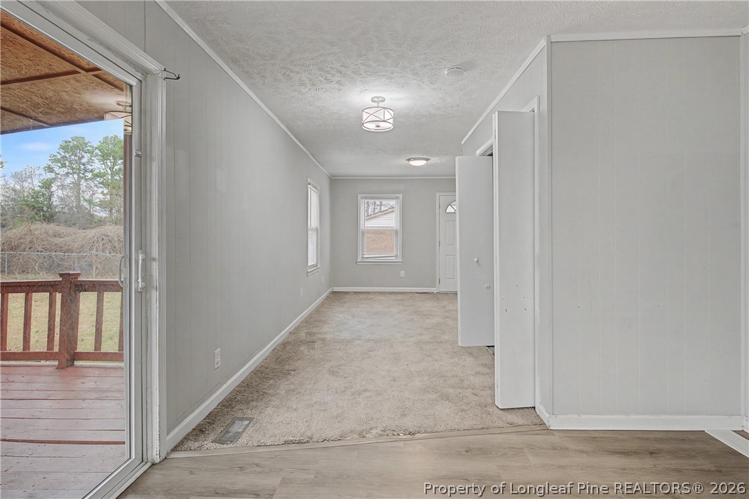 1931 Pumpkin Road Fayetteville, NC 28304 - Photo 20 of 48 a view of livingroom with window and hardwood floor