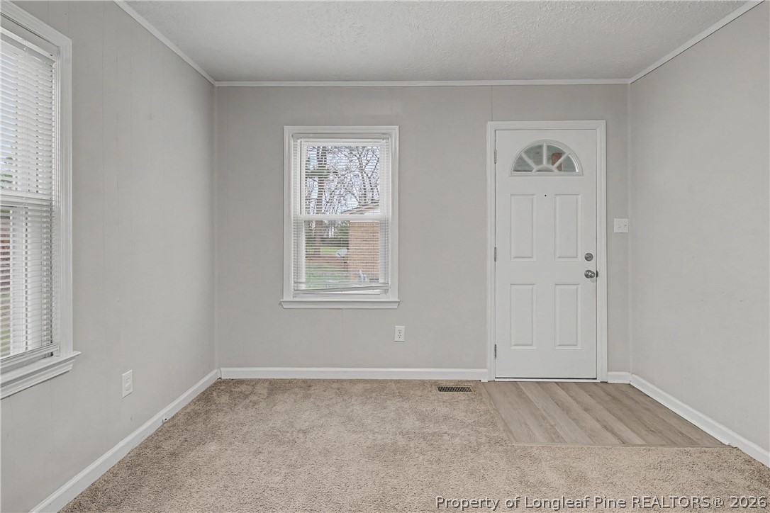 1931 Pumpkin Road Fayetteville, NC 28304 - Photo 24 of 48 an empty room with windows