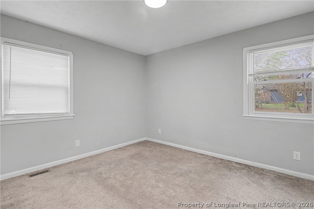 1931 Pumpkin Road Fayetteville, NC 28304 - Photo 25 of 48 an empty room with a window