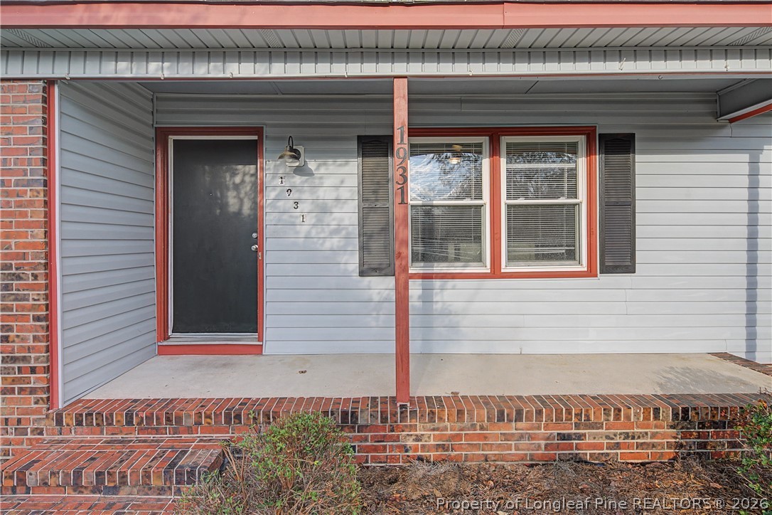 1931 Pumpkin Road Fayetteville, NC 28304 - Photo 4 of 48 a front view of a house with a window