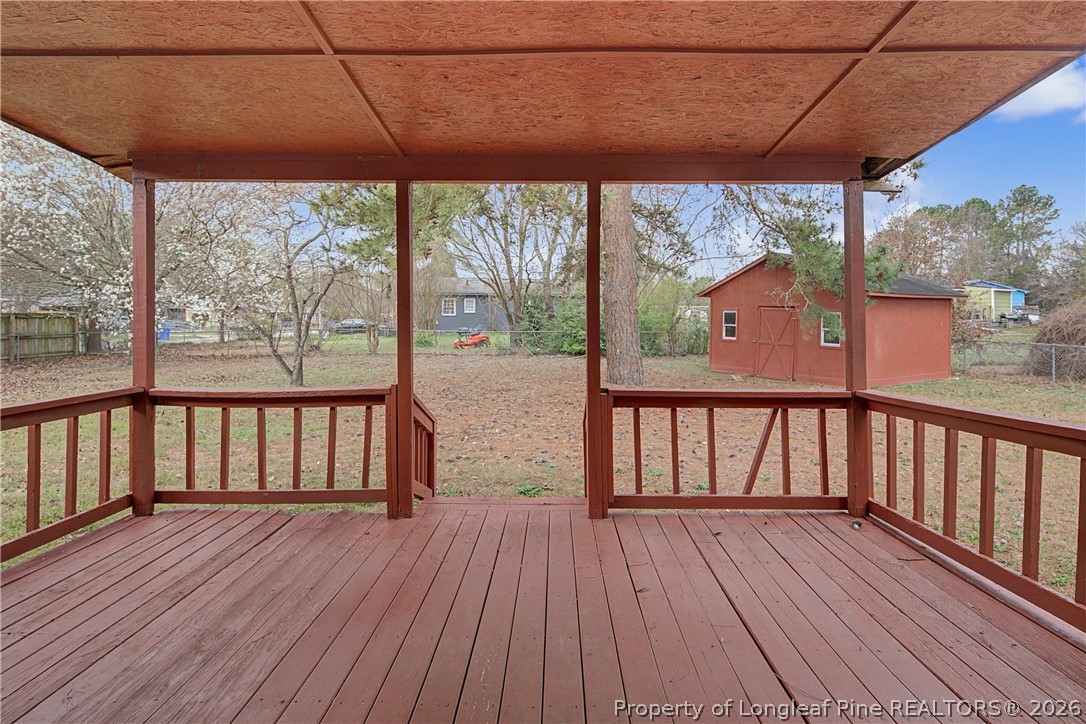 1931 Pumpkin Road Fayetteville, NC 28304 - Photo 41 of 48 a view of a balcony with wooden floor
