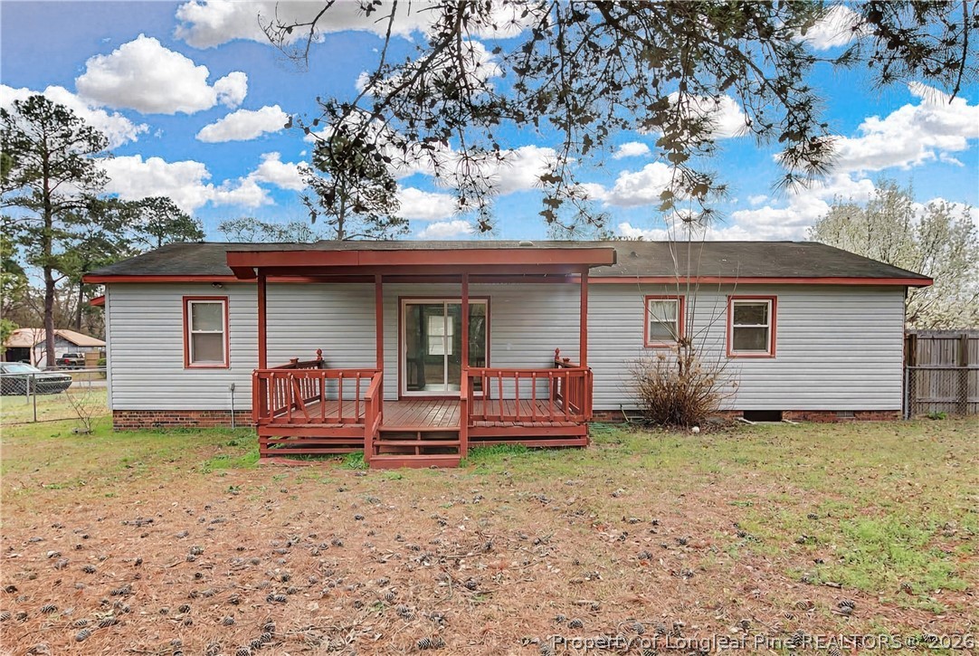 1931 Pumpkin Road Fayetteville, NC 28304 - Photo 42 of 48 a view of a house with backyard porch and sitting area