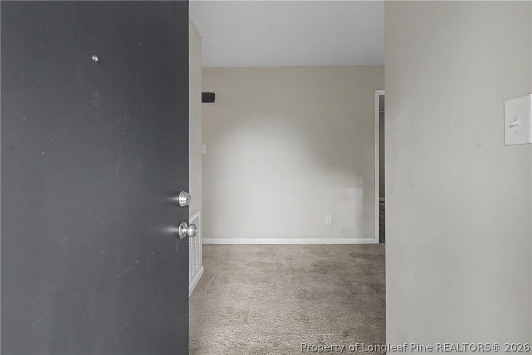 1931 Pumpkin Road Fayetteville, NC 28304 - Photo 5 of 48 close view of an empty room