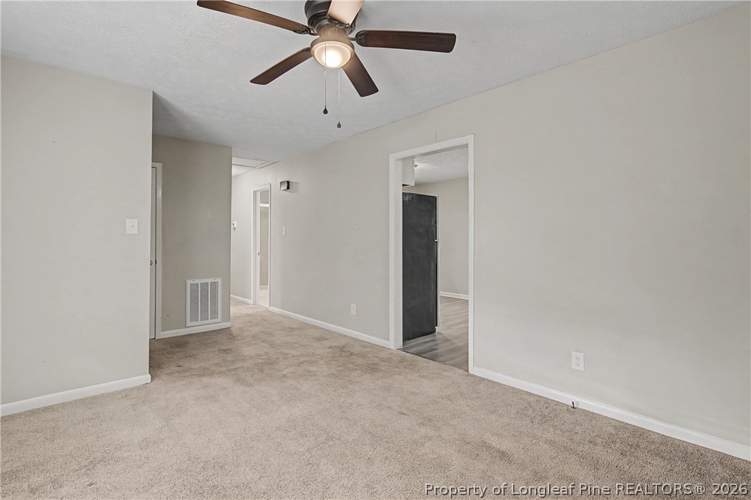 1931 Pumpkin Road Fayetteville, NC 28304 - Photo 10 of 48 wooden floor in an empty room