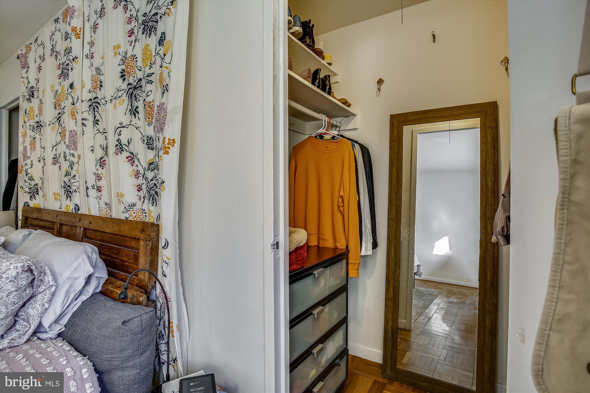 3900 Tunlaw Road Northwest, Unit 118 Washington, DC 20007 - Photo 20 of 58 a view of walk in closet with clothes and shoes
