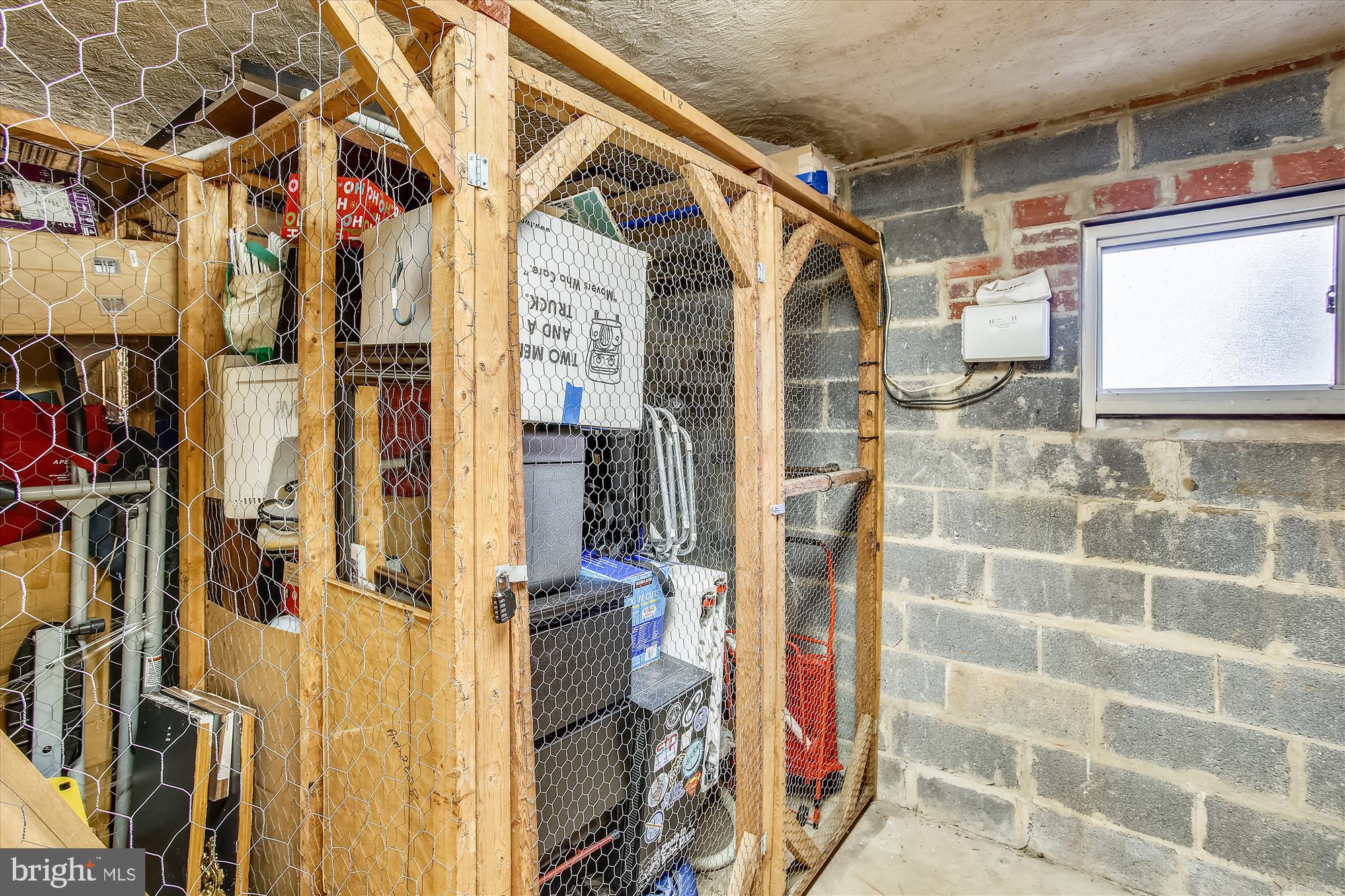 3900 Tunlaw Road Northwest, Unit 118 Washington, DC 20007 - Photo 23 of 58 a view of walk in closet with clothes and shoes