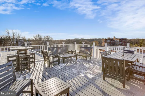 a view of a terrace with chairs