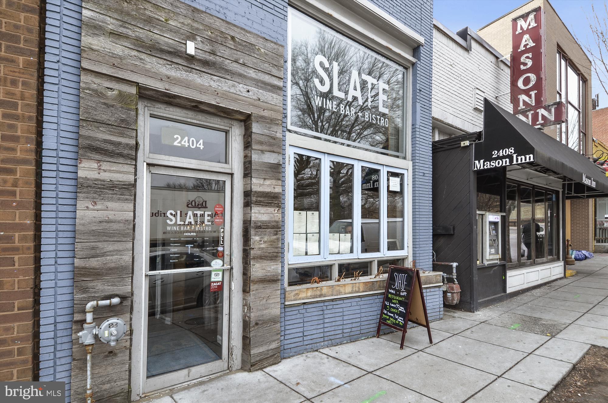 3900 Tunlaw Road Northwest, Unit 118 Washington, DC 20007 - Photo 29 of 58 a view of a building with a glass door and glass door