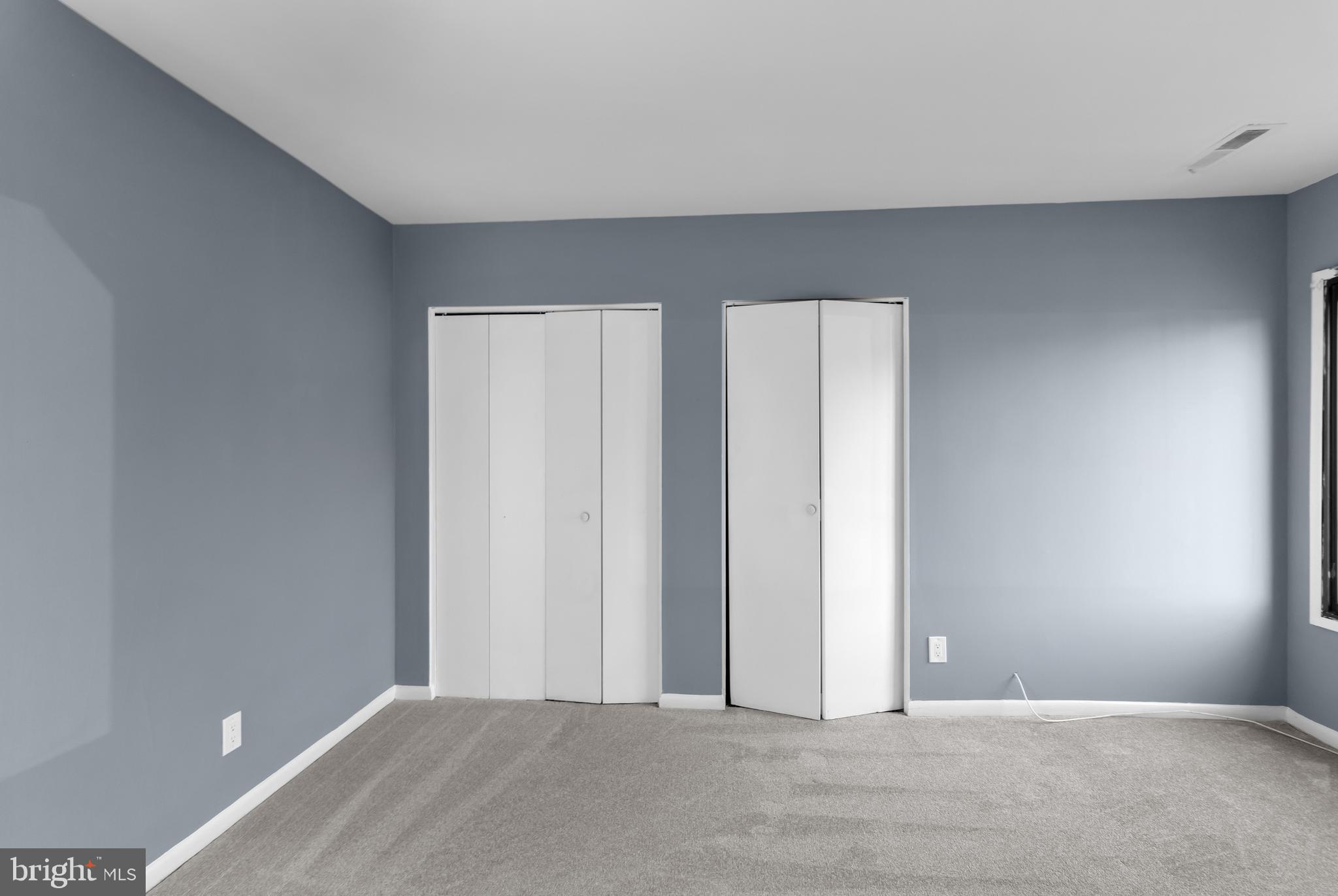 10121 Prince Place, Unit 30110B Upper Marlboro, MD 20774 - Photo 14 of 29 a view of an empty room and window