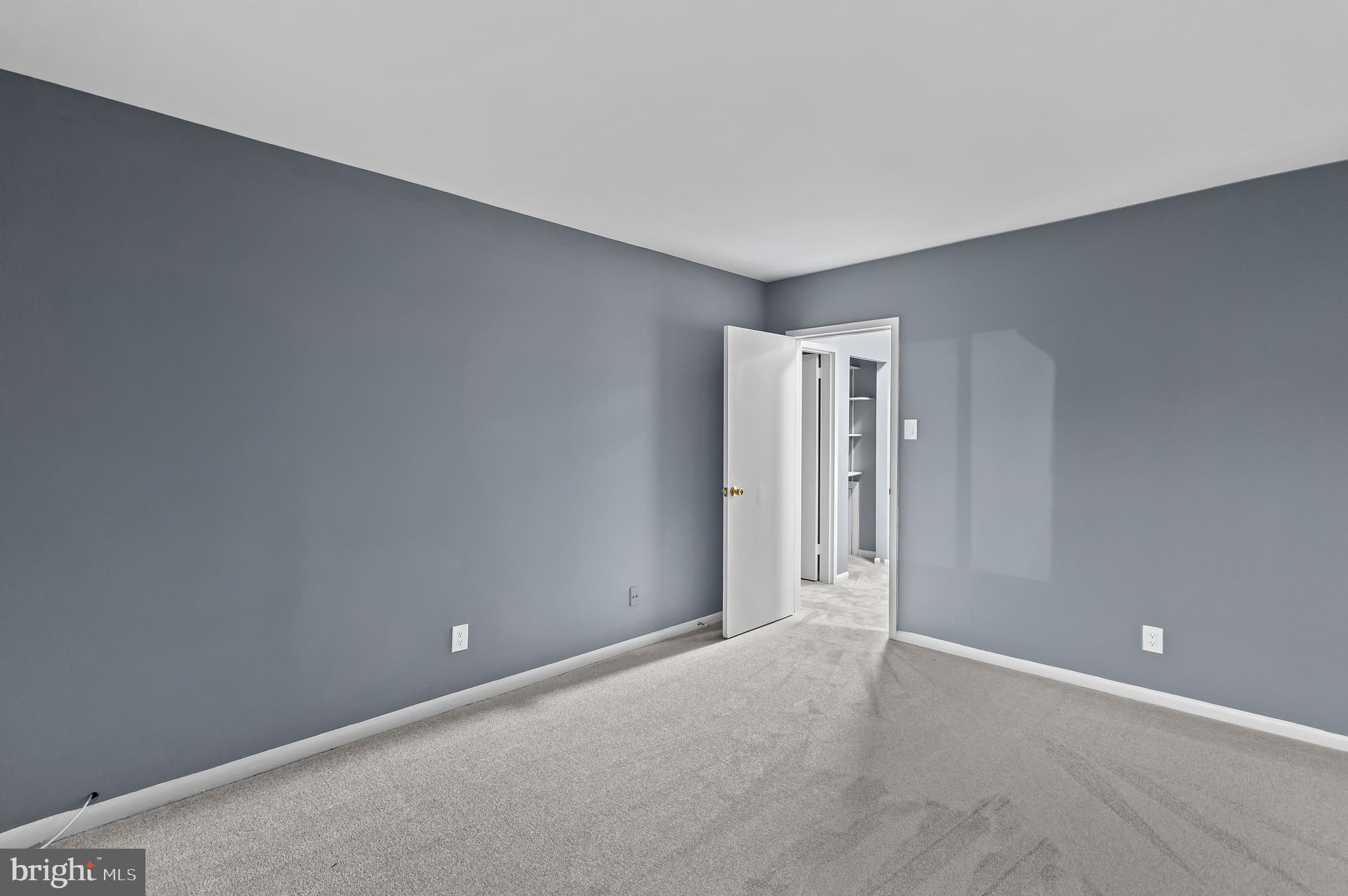 10121 Prince Place, Unit 30110B Upper Marlboro, MD 20774 - Photo 18 of 29 a view of an empty room