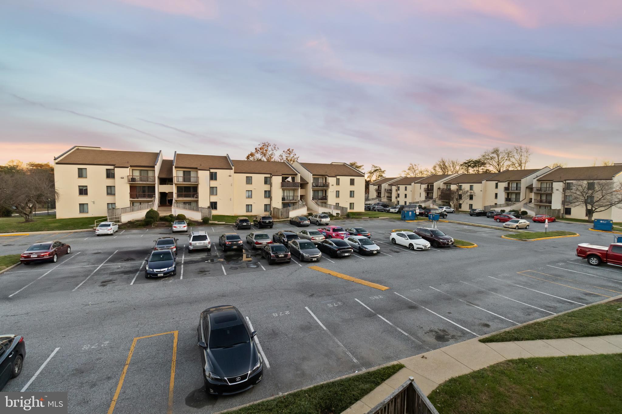 10121 Prince Place, Unit 30110B Upper Marlboro, MD 20774 - Photo 25 of 29 a view of a street with cars