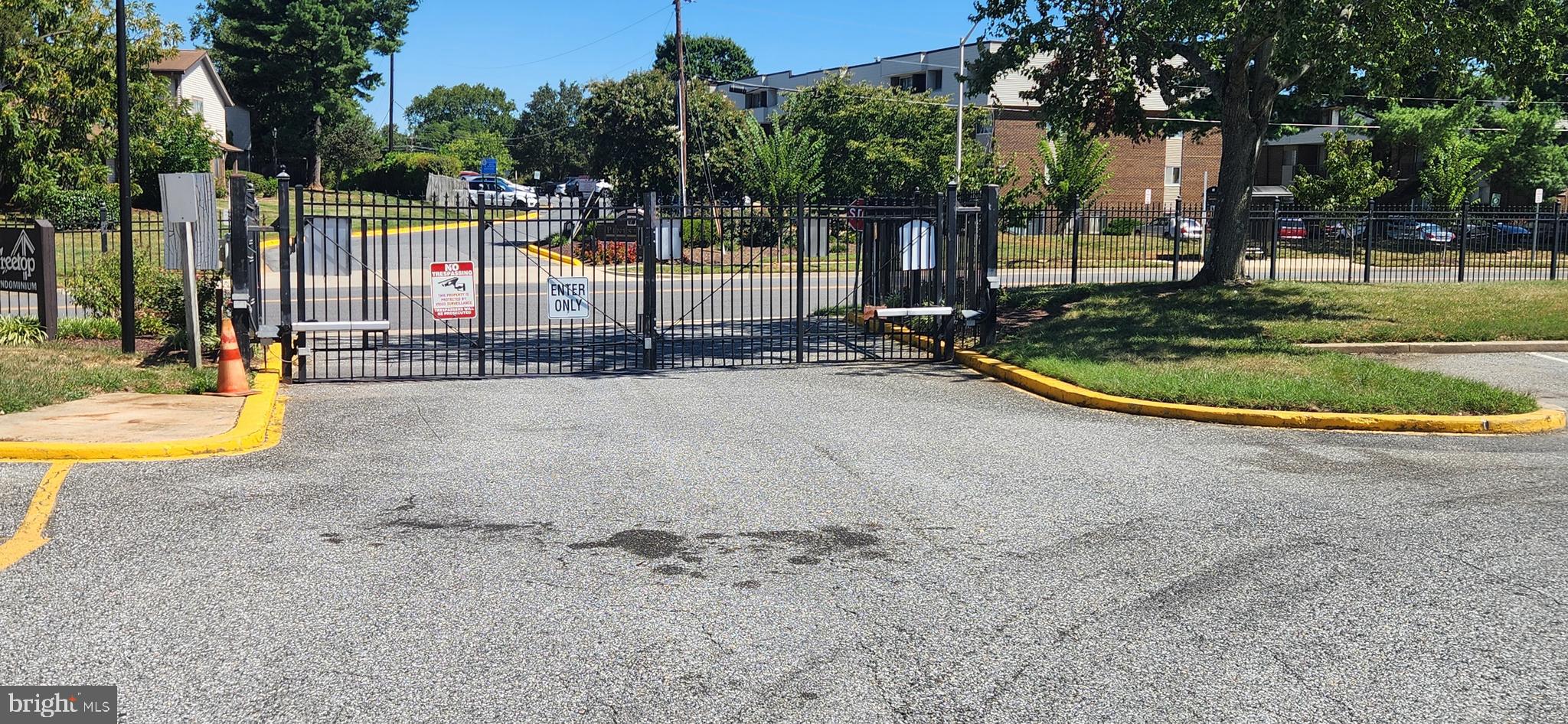 10121 Prince Place, Unit 30110B Upper Marlboro, MD 20774 - Photo 29 of 29 a view of a swimming pool with a patio