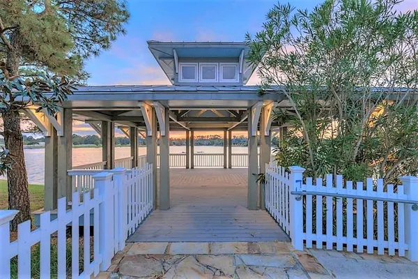 a view of entryway with deck and wooden floor