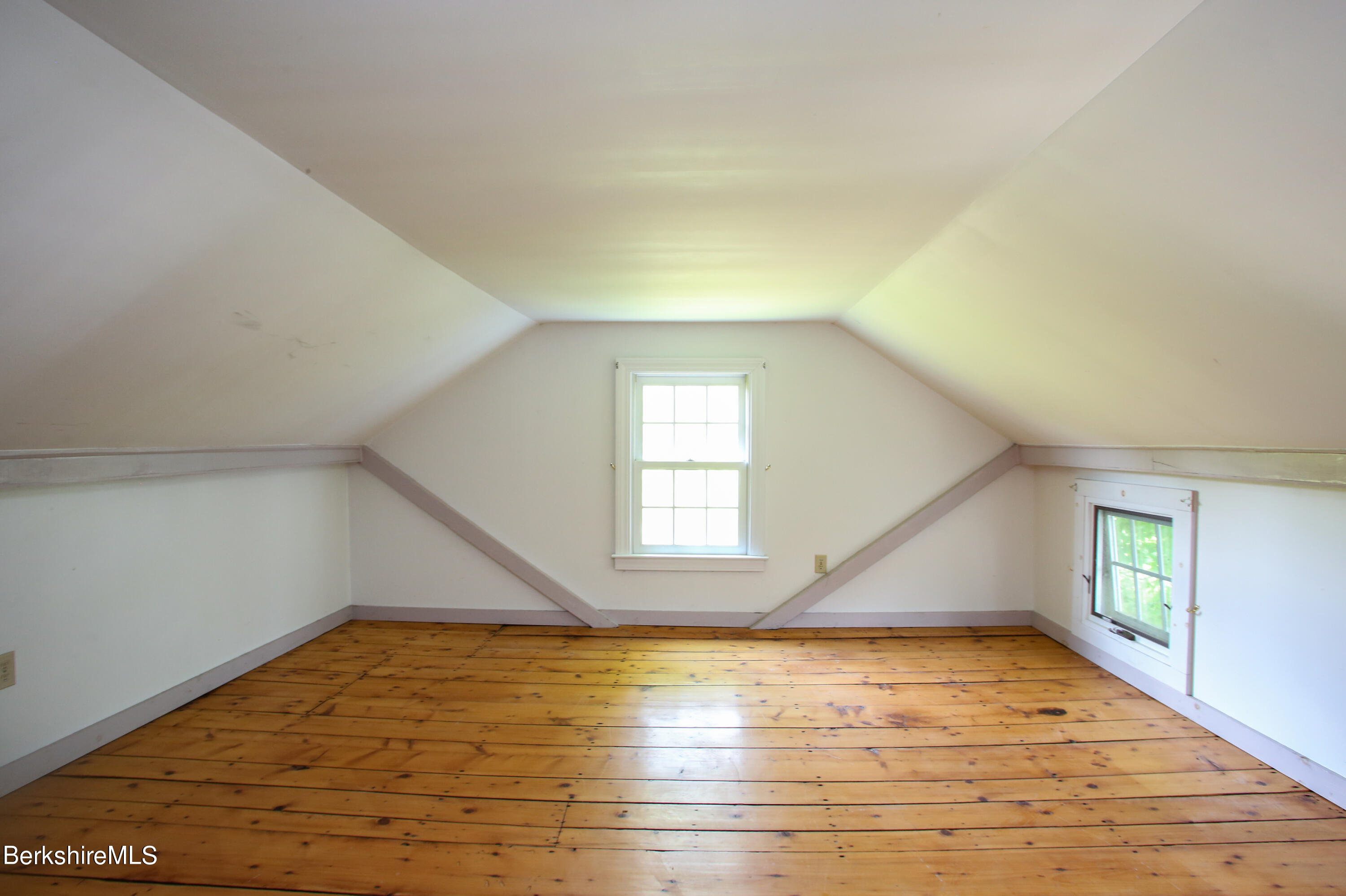 1256 East Windsor Road Windsor, MA 01270 - Photo 21 of 34 an empty room with wooden floor and windows