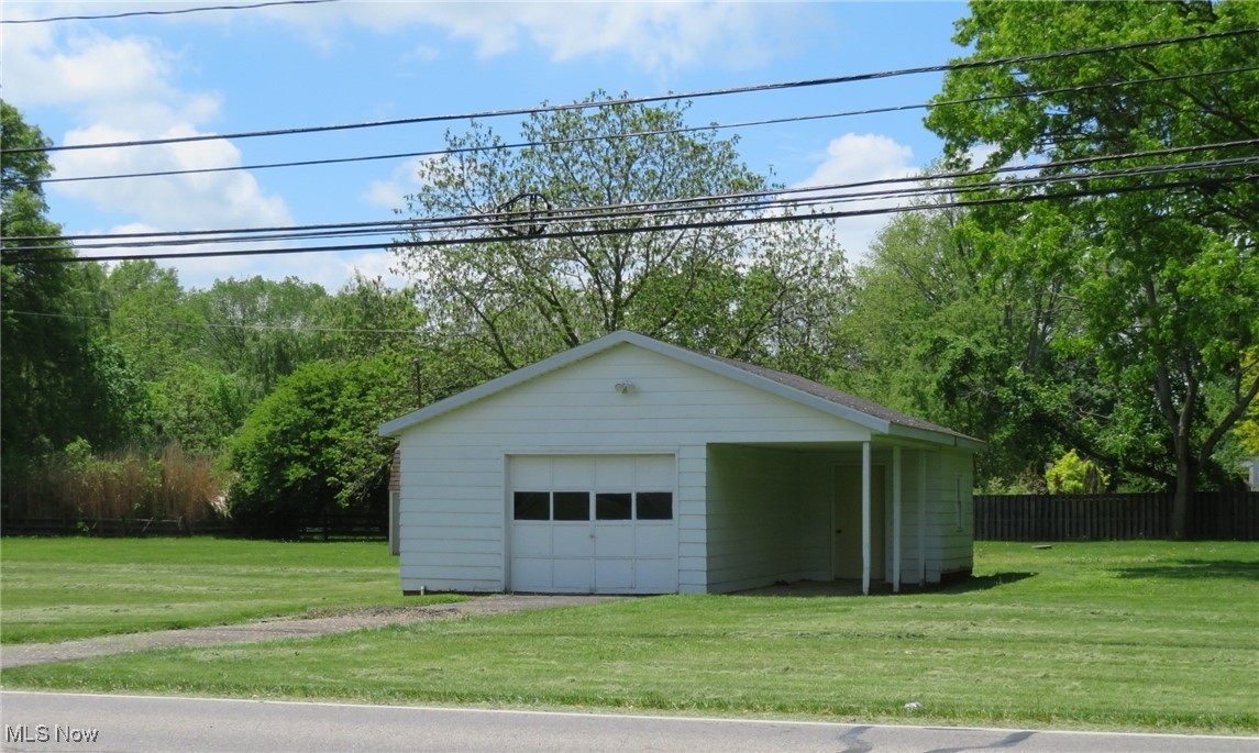 38505 Sugar Ridge Road North Ridgeville, OH 44039 - Photo 6 of 44 The outbuilding has its own driveway (on the Bender Rd side). It has a space heater and work benches inside. Was being used as a workshop.
