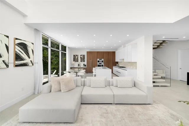 a bathroom with a double vanity sink toilet and a mirror
