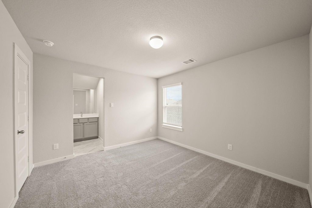 3130 Soaring Pines Trail Conroe, TX 77301 - Photo 11 of 17 a view of an empty room with a window