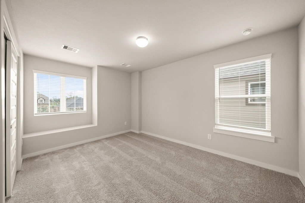 3130 Soaring Pines Trail Conroe, TX 77301 - Photo 14 of 17 an empty room with a window
