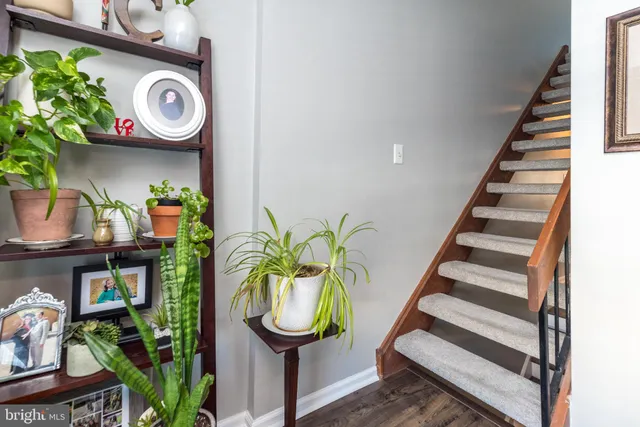 a bedroom with a bed furniture and decor