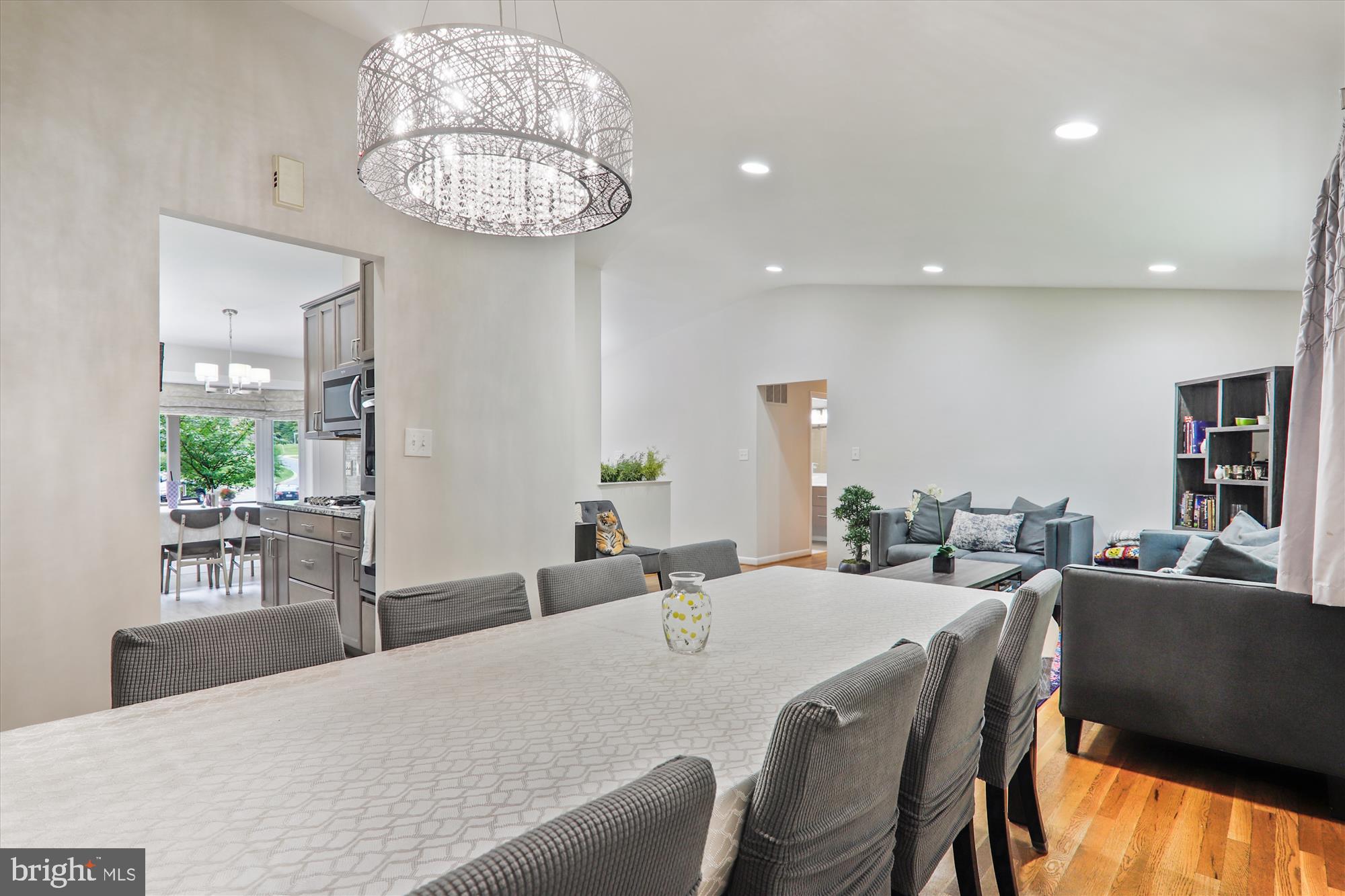 11804 Lovejoy Street Silver Spring, MD 20902 - Photo 12 of 45 a large kitchen with a table and chairs