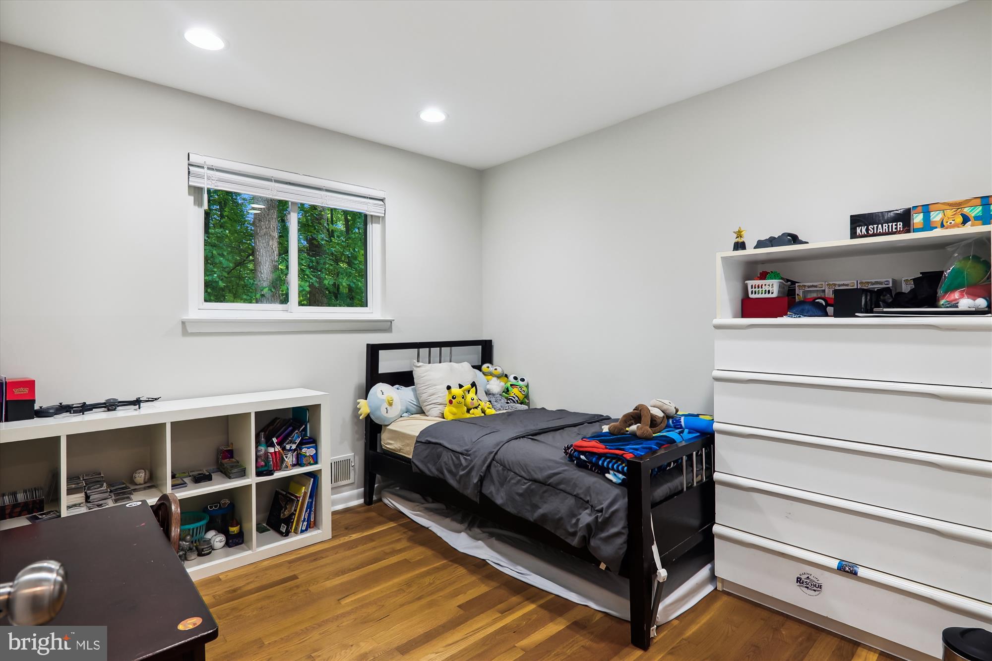 11804 Lovejoy Street Silver Spring, MD 20902 - Photo 19 of 45 a bedroom with a bed and a window