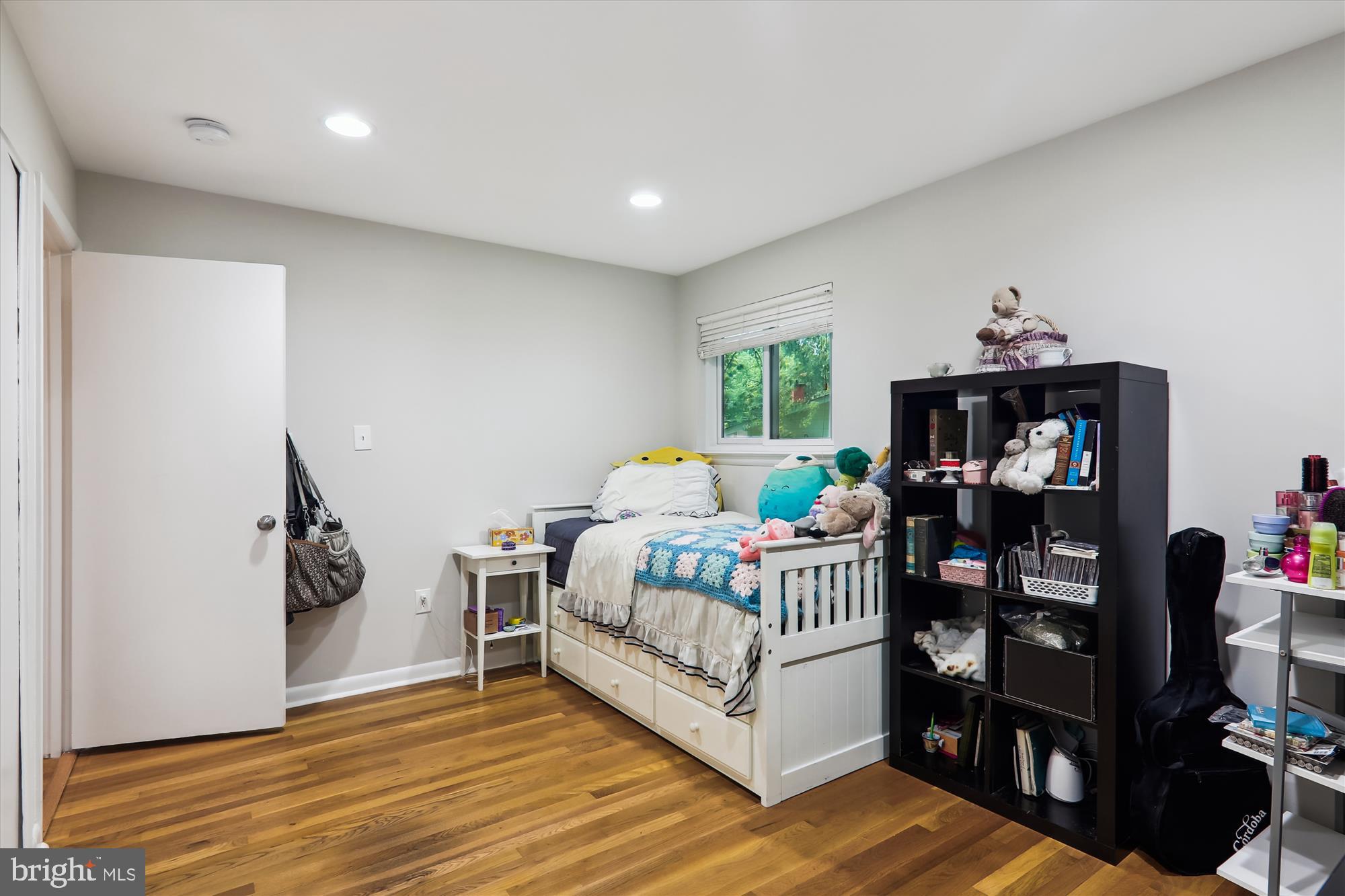11804 Lovejoy Street Silver Spring, MD 20902 - Photo 22 of 45 a bedroom with furniture and wooden floor