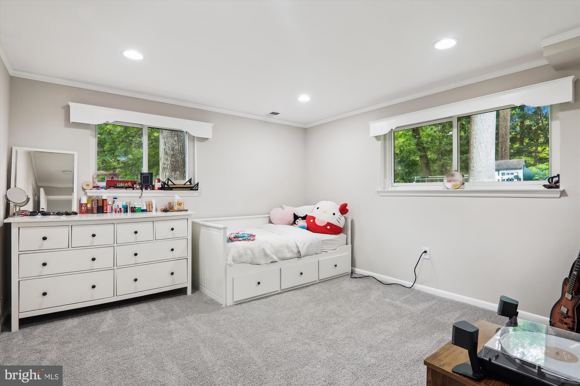 11804 Lovejoy Street Silver Spring, MD 20902 - Photo 28 of 45 a room with a dresser and a window