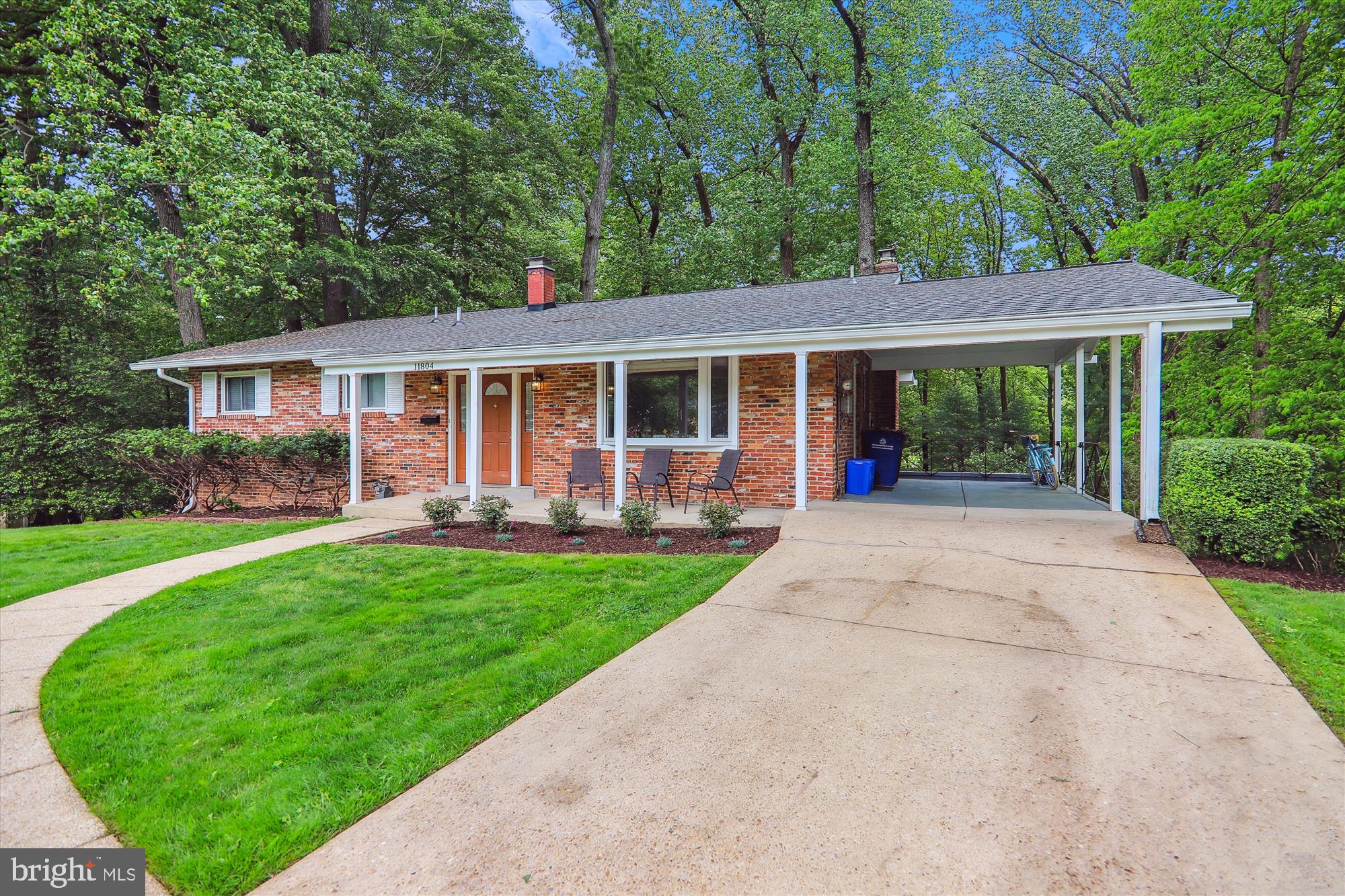 11804 Lovejoy Street Silver Spring, MD 20902 - Photo 3 of 45 front view of a house with a yard