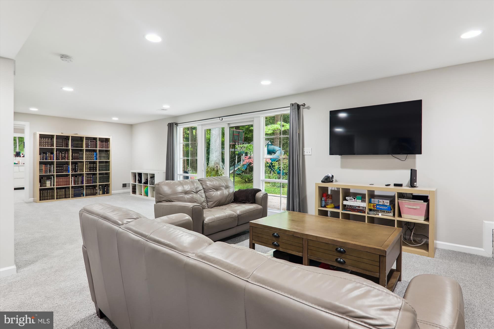 11804 Lovejoy Street Silver Spring, MD 20902 - Photo 39 of 45 a living room with furniture and a flat screen tv