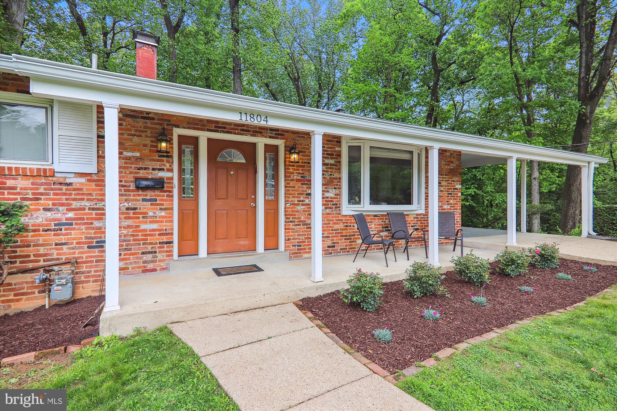 11804 Lovejoy Street Silver Spring, MD 20902 - Photo 4 of 45 a front view of a house with garden