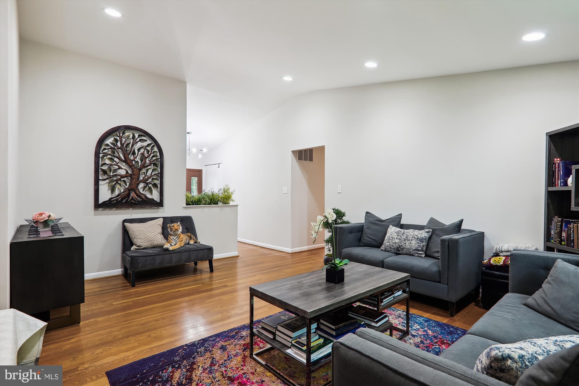 11804 Lovejoy Street Silver Spring, MD 20902 - Photo 8 of 45 a living room with furniture and a wooden floor