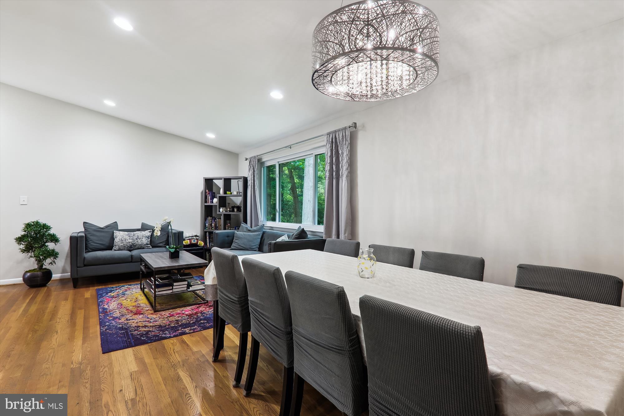 11804 Lovejoy Street Silver Spring, MD 20902 - Photo 10 of 45 a bedroom with a bed and wooden floor