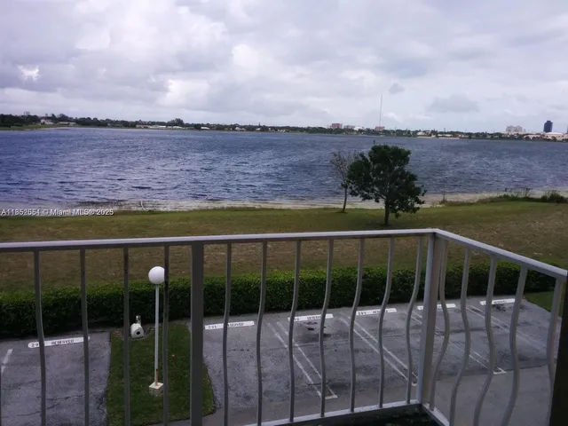 a view of a balcony with an ocean view