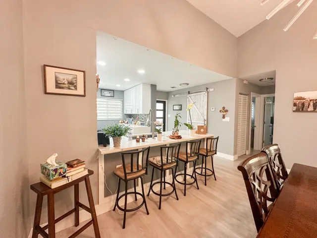 a view of a dining room with furniture