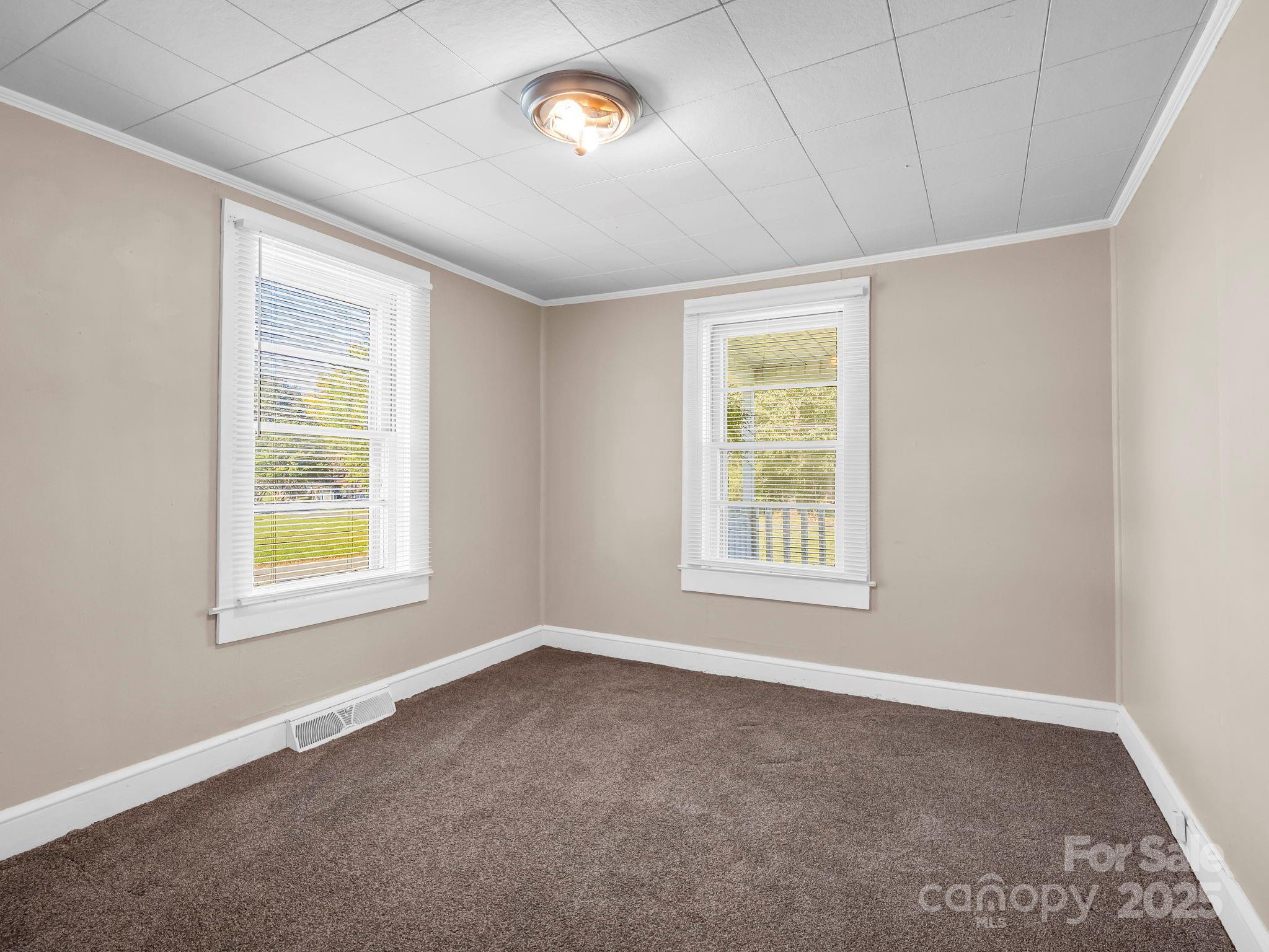 264 Goode Road Mooresboro, NC 28114 - Photo 16 of 36 an empty room with a window