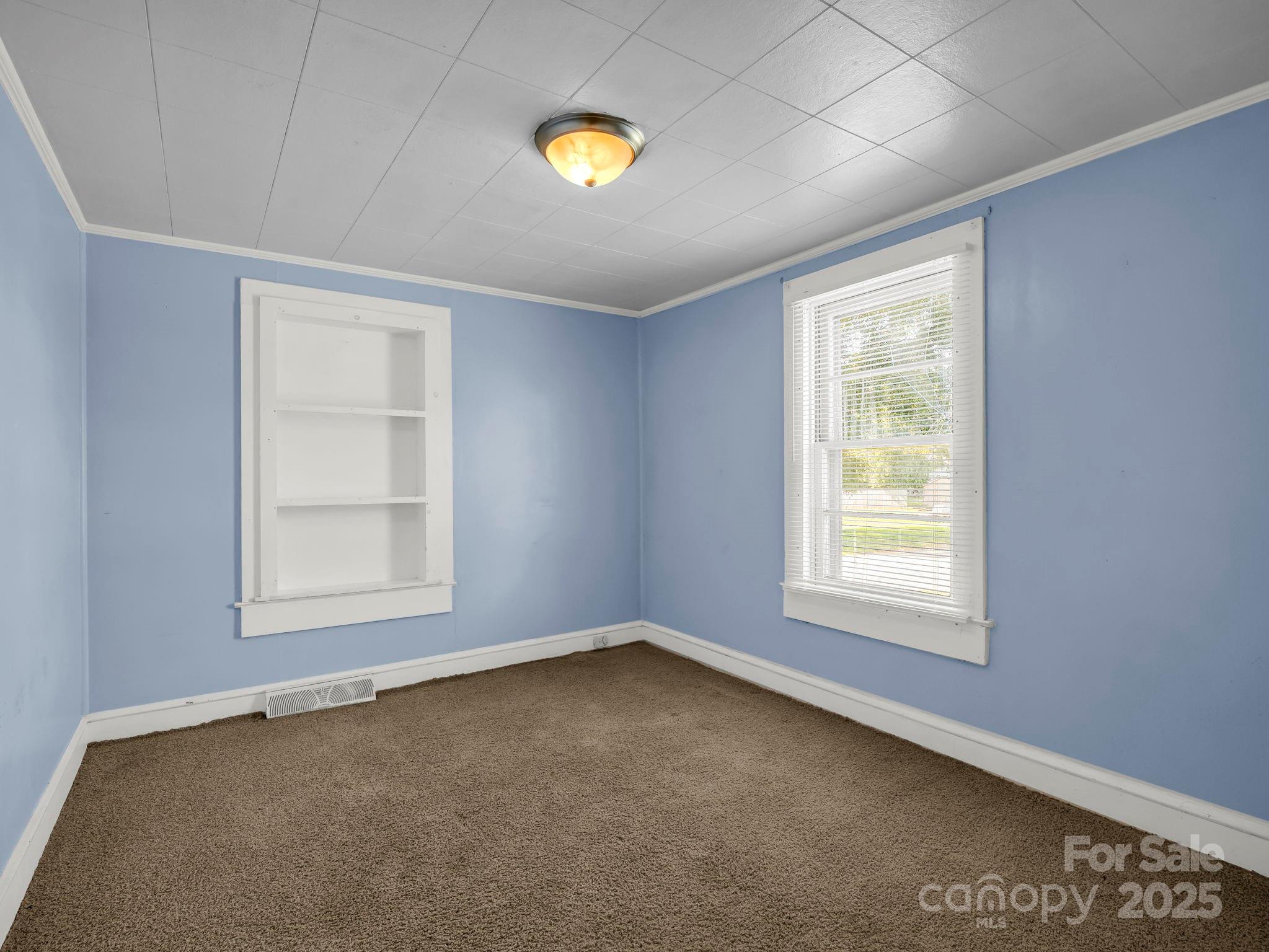264 Goode Road Mooresboro, NC 28114 - Photo 17 of 36 an empty room with a window