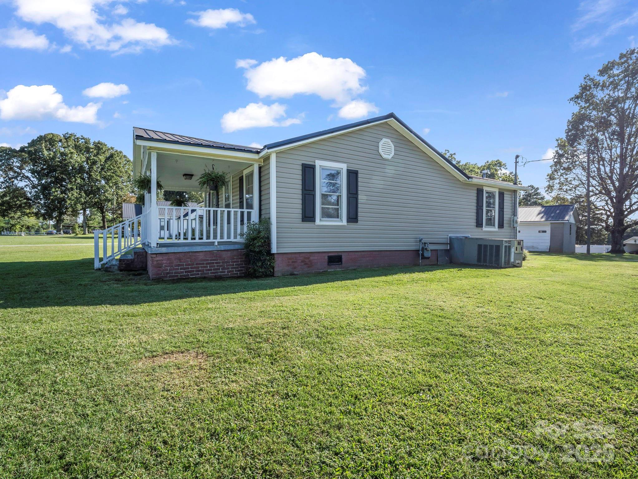 264 Goode Road Mooresboro, NC 28114 - Photo 26 of 36 a front view of house with yard and green space
