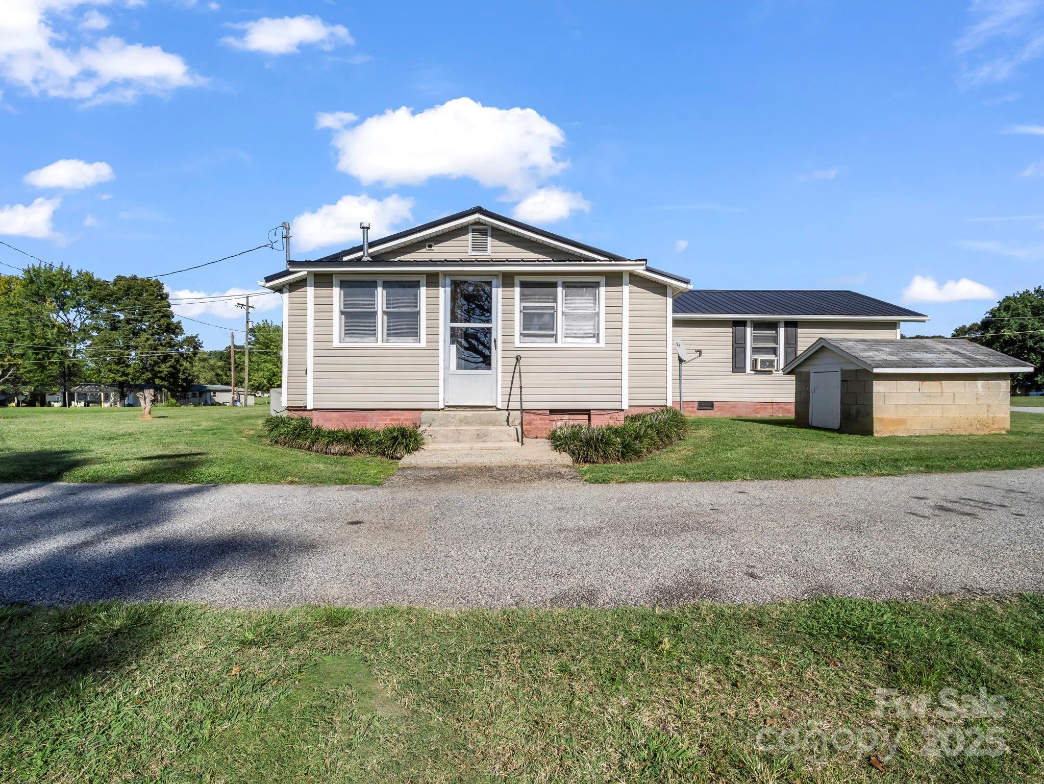 264 Goode Road Mooresboro, NC 28114 - Photo 29 of 36 a front view of a house with a yard