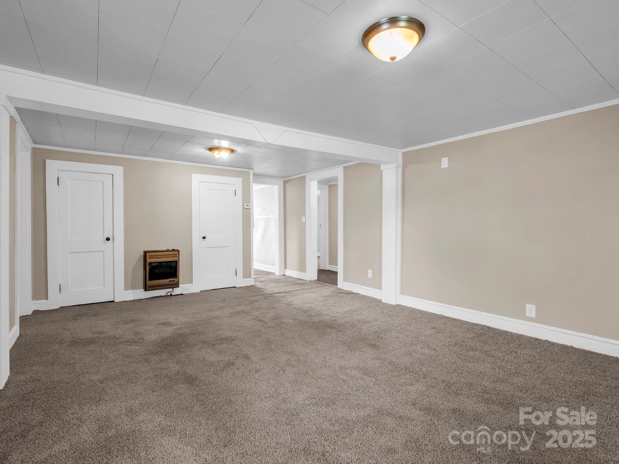 264 Goode Road Mooresboro, NC 28114 - Photo 5 of 36 a view of an empty room with a window