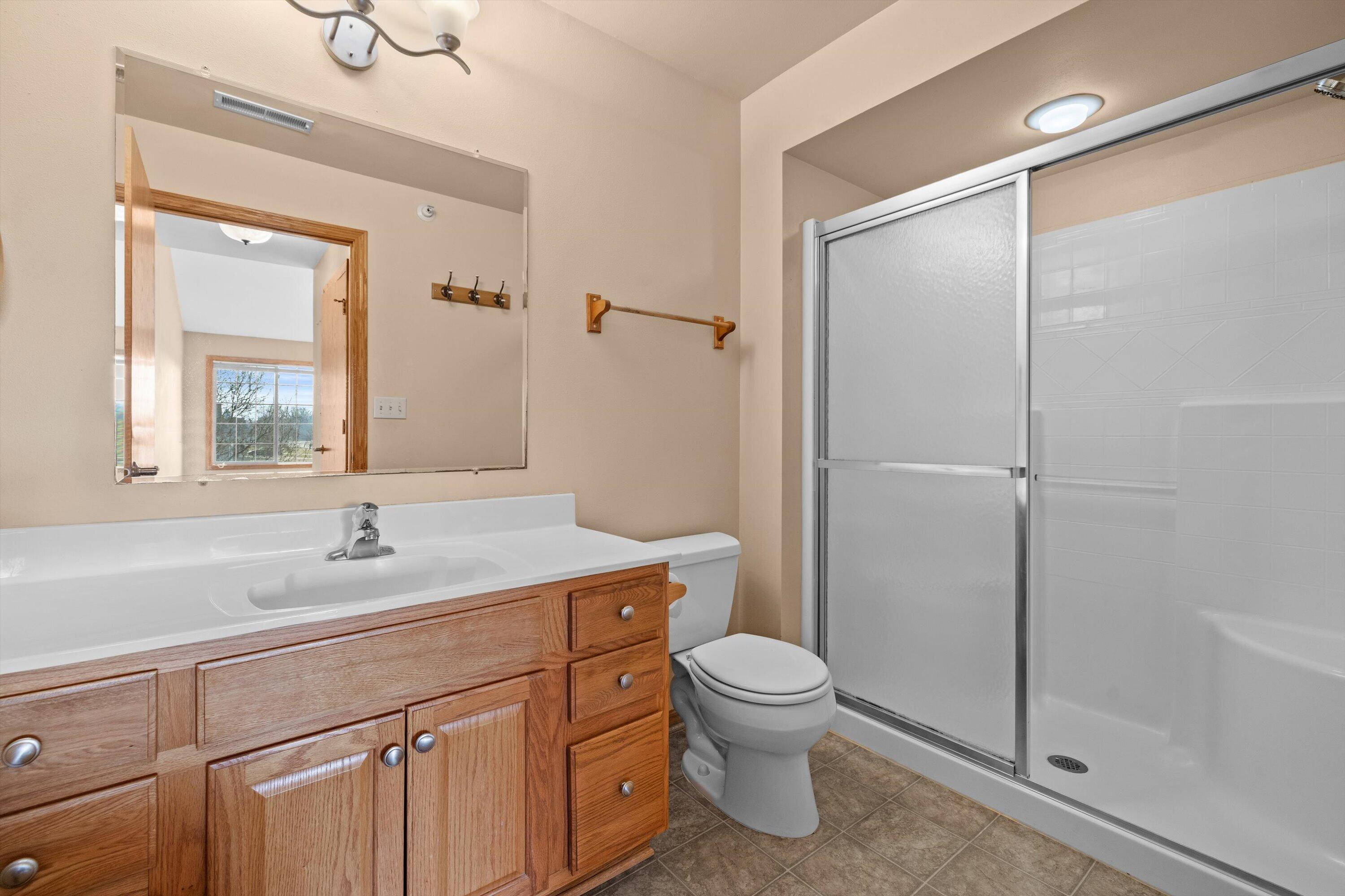 1540 Raintree Lane, Unit 128 Mount Pleasant, WI 53406 - Photo 17 of 31 bathroom