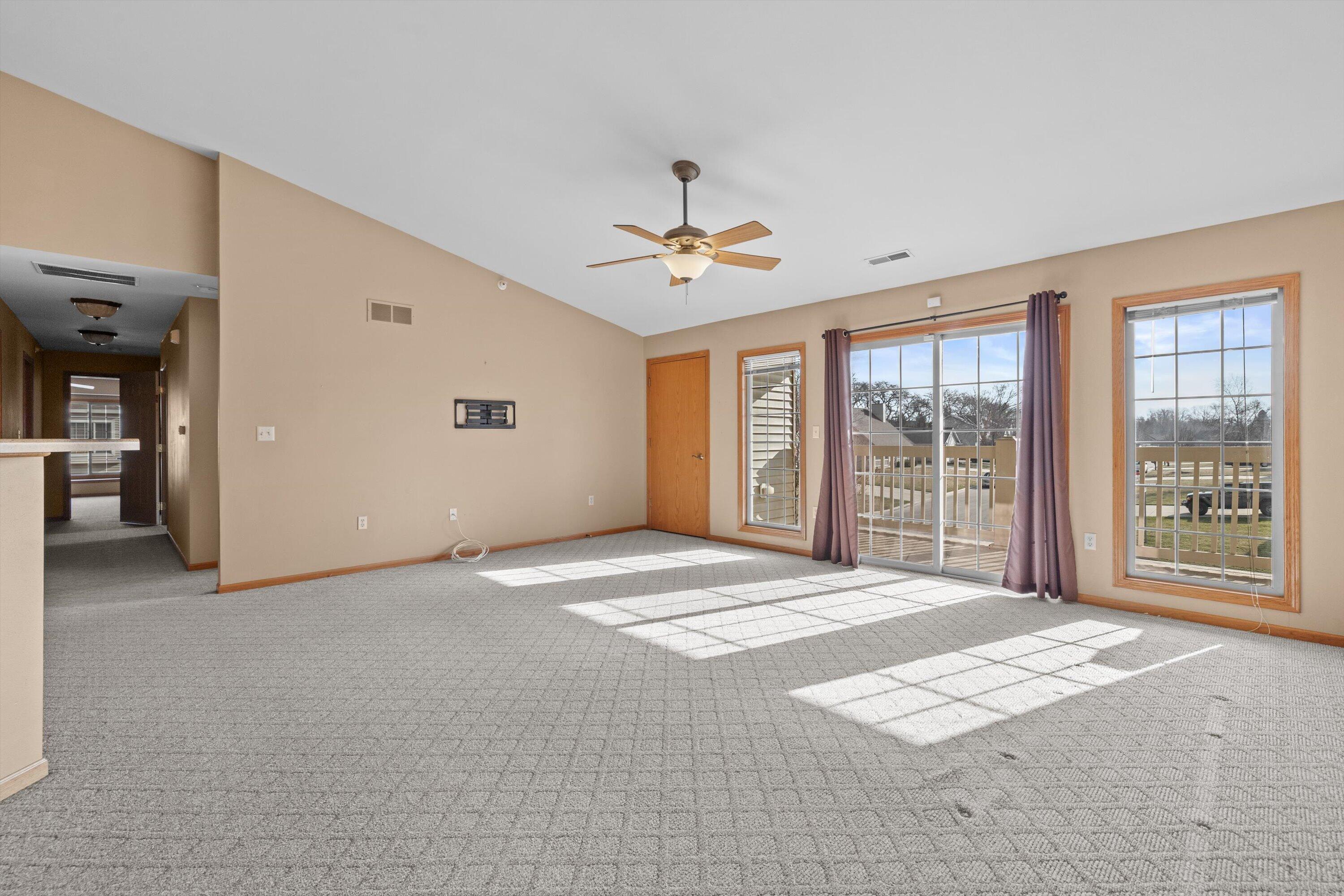 1540 Raintree Lane, Unit 128 Mount Pleasant, WI 53406 - Photo 2 of 31 living room