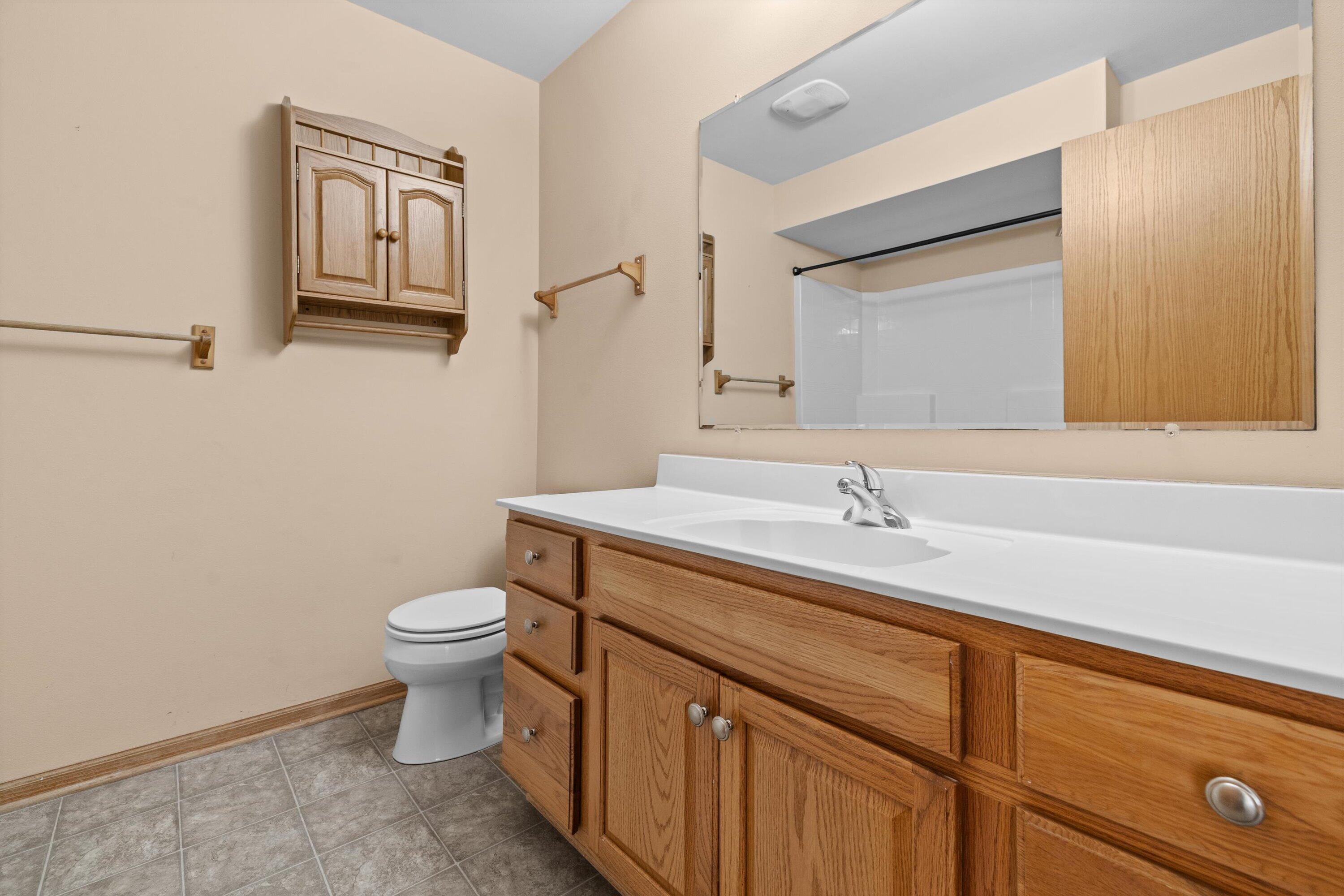 1540 Raintree Lane, Unit 128 Mount Pleasant, WI 53406 - Photo 22 of 31 bathroom