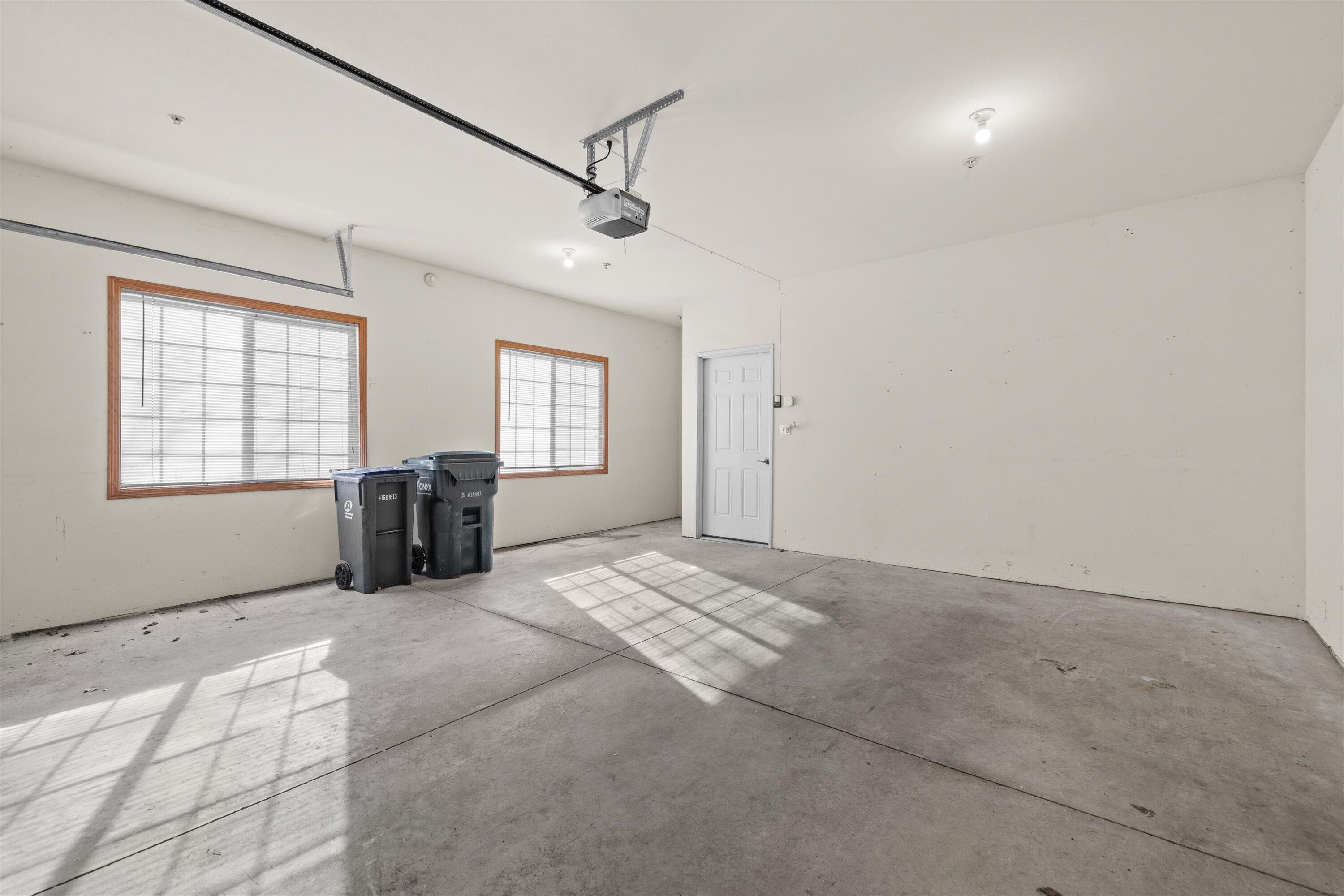 1540 Raintree Lane, Unit 128 Mount Pleasant, WI 53406 - Photo 26 of 31 garage