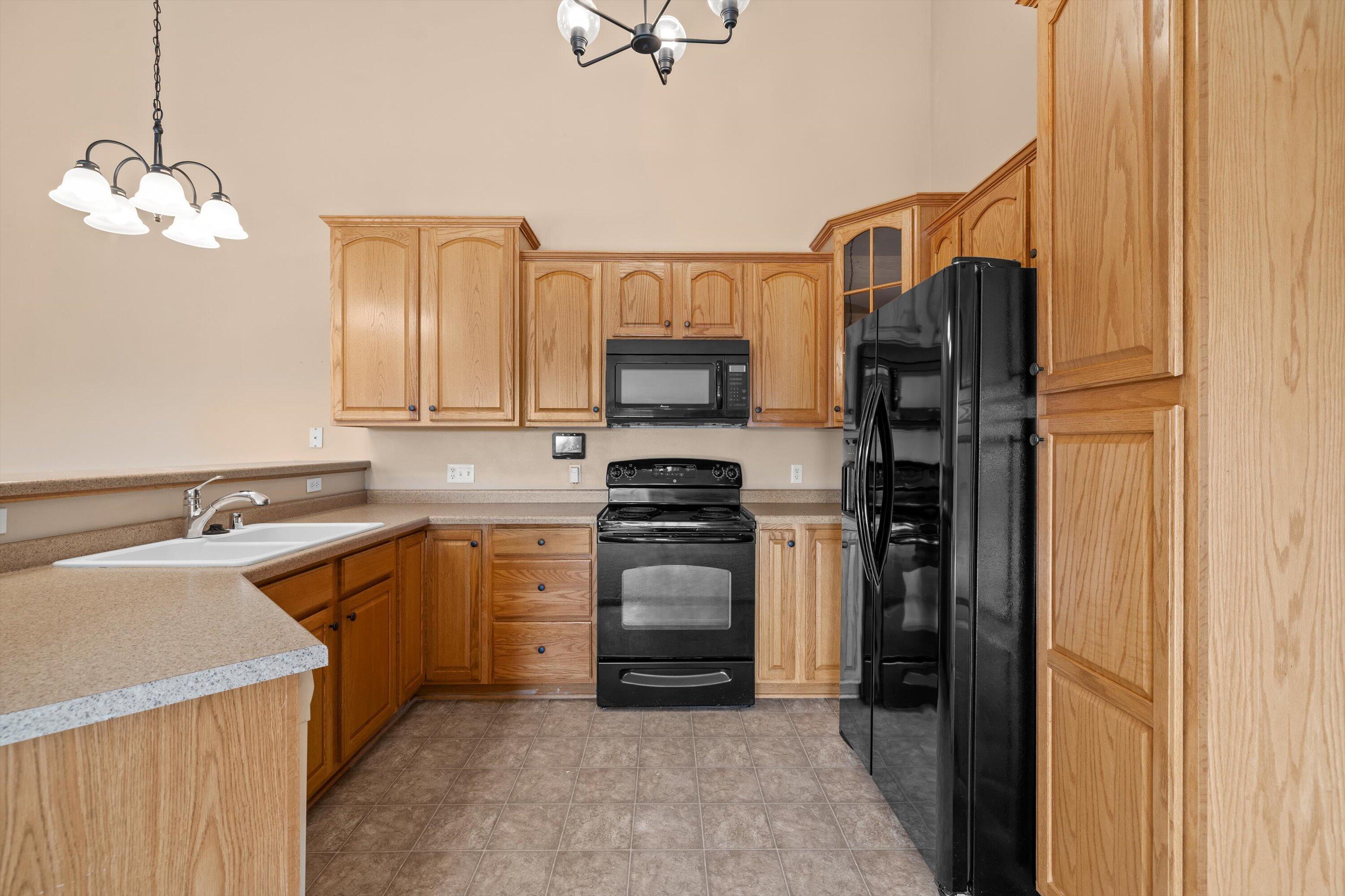 1540 Raintree Lane, Unit 128 Mount Pleasant, WI 53406 - Photo 8 of 31 kitchen