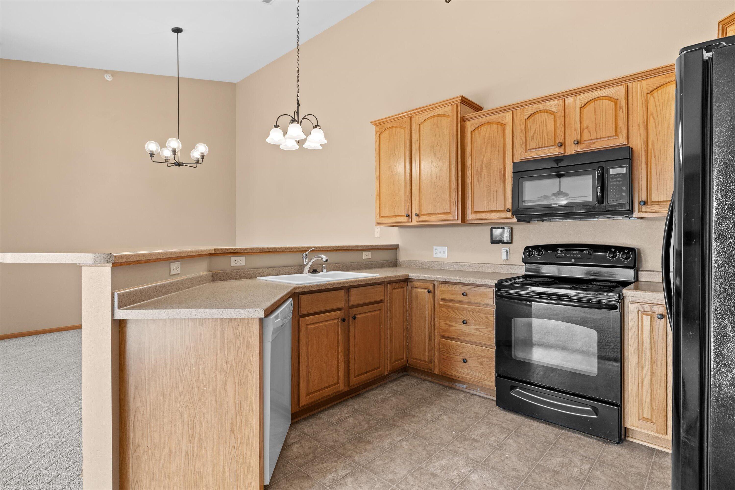 1540 Raintree Lane, Unit 128 Mount Pleasant, WI 53406 - Photo 9 of 31 kitchen