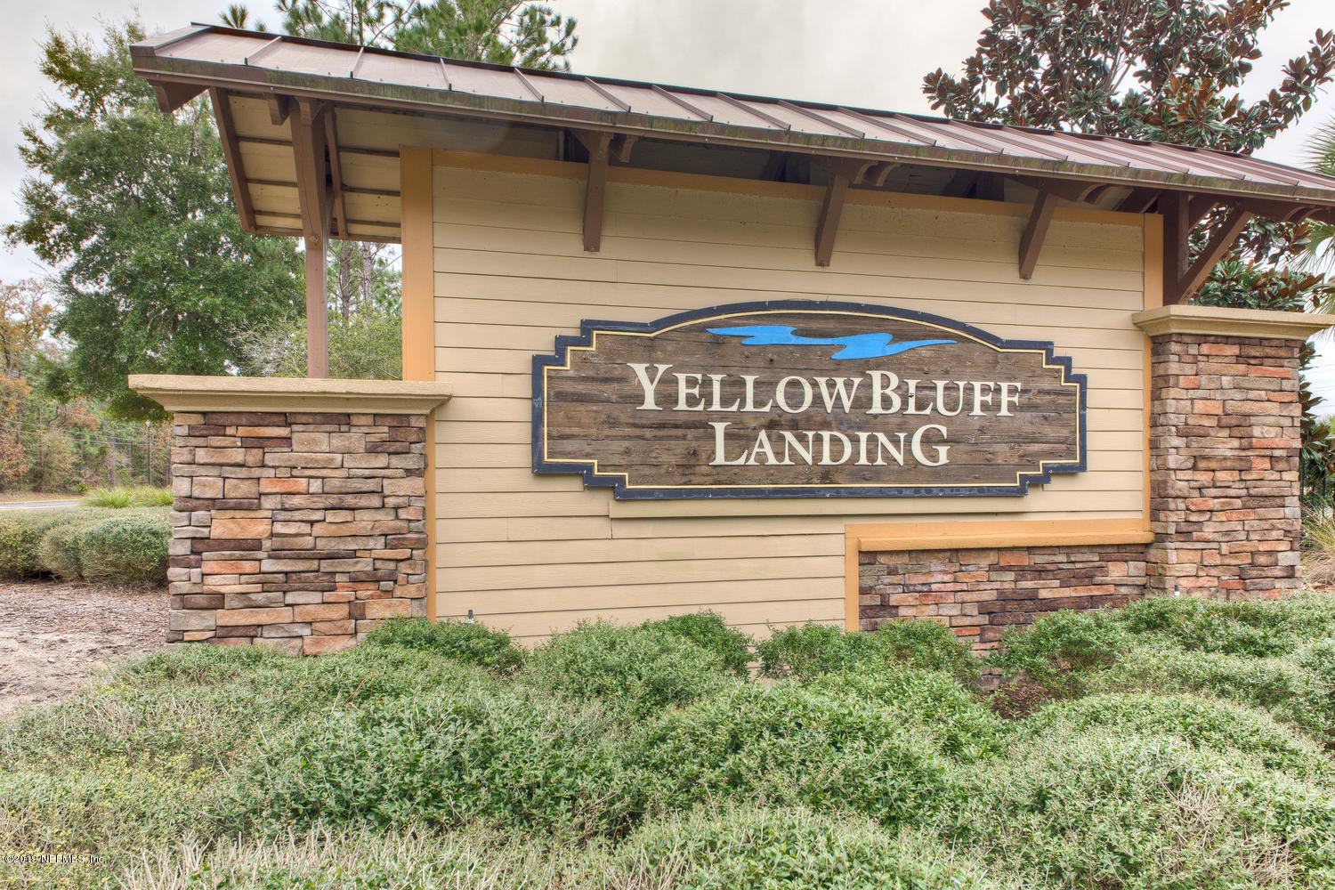 16357 Tisons Bluff Road Jacksonville, FL 32218 - Photo 1 of 31 a sign on the side of a building