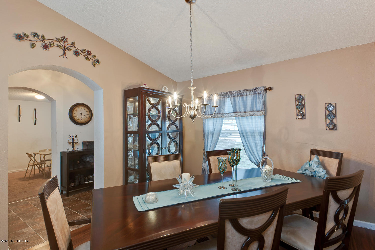 16357 Tisons Bluff Road Jacksonville, FL 32218 - Photo 6 of 31 a view of a dining room with furniture